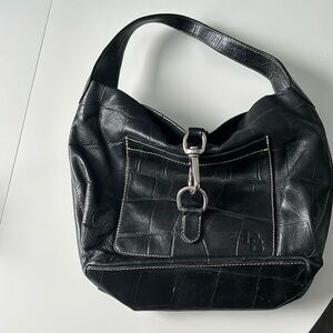Gently used black leather Dooney & Bourke shoulder bag.